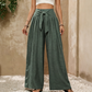 Pantalon large à taille haute et nœud frontal pour femme